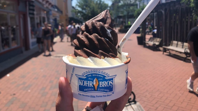 Someone holding a cup of frozen custard from Kohr Bros Frozen Custard