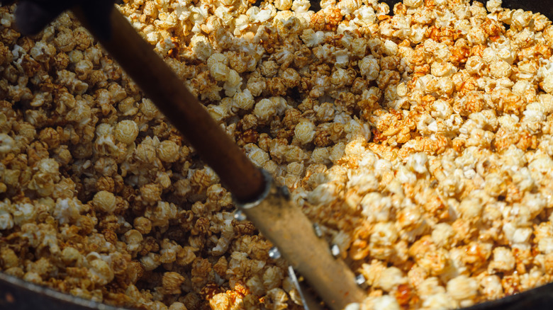 Kettle corn inside of a rotary popcorn machine