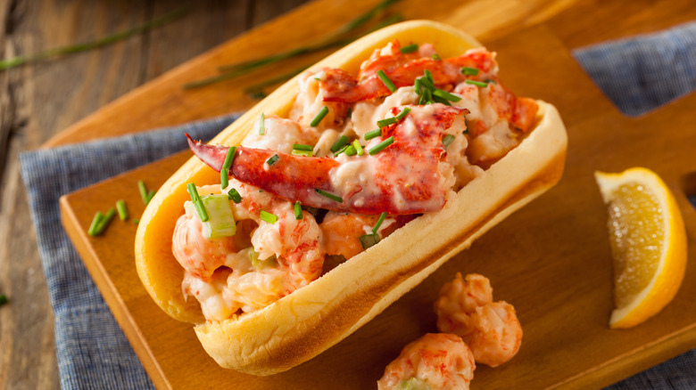 A lobster roll on a cutting board