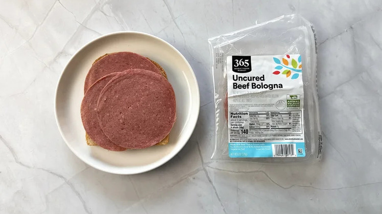 365 brand uncured beef bologna from whole foods on a white stone countertop