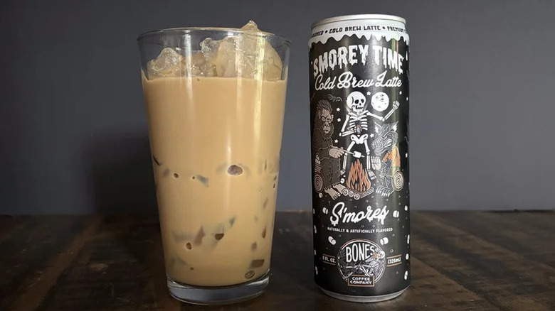 Bones Coffee Co. S'morey Time canned latte beside a glass of the drink