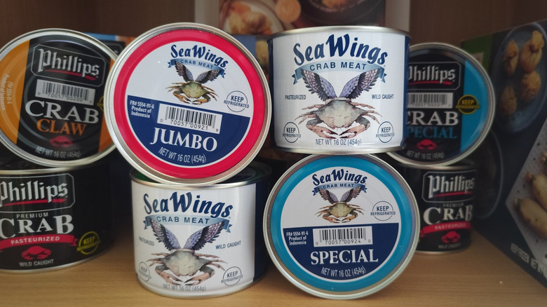 Variety of different types of canned crab meat