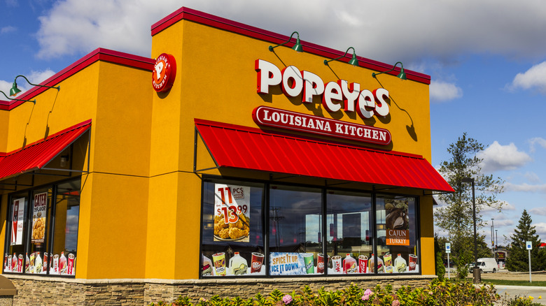 Popeyes location under blue skies