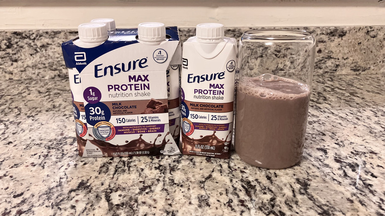 Ensure protein shake in bottles and in a glass