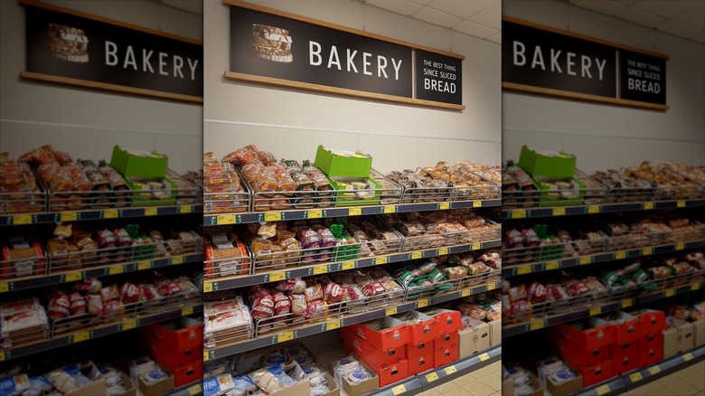 The bakery section at an Aldi with full rows of baked goods