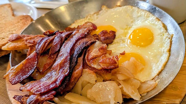 Eggs and bacon in skillet at Lou Mitchell's