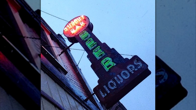 Neon sign outside the Dugout bar