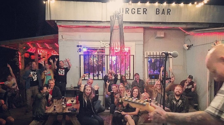 People listening to music at Burger Bar