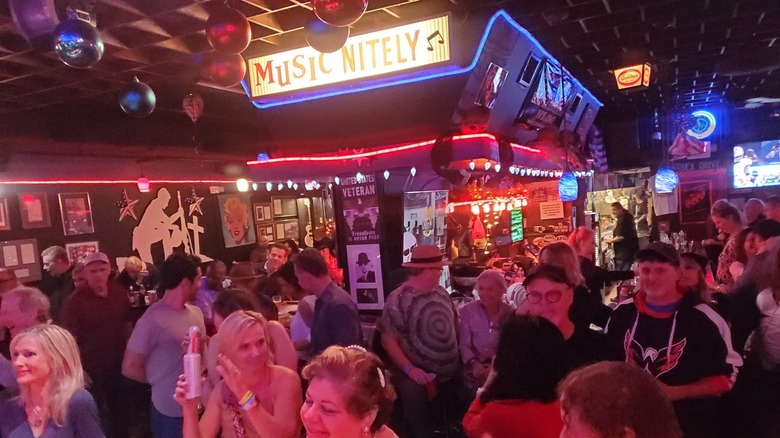 People gathered in JV's Restaurant