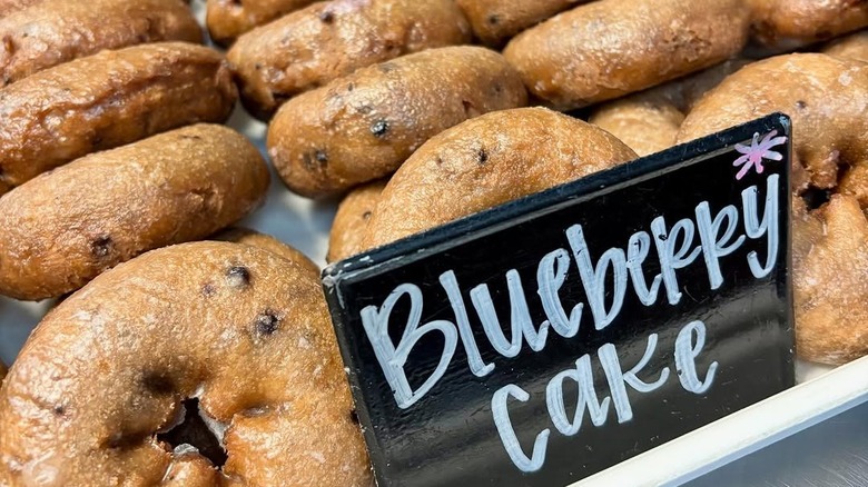 Blueberry cake donuts displayed