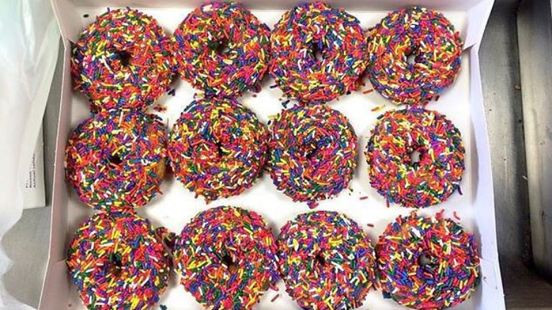 Box of donuts with sprinkles