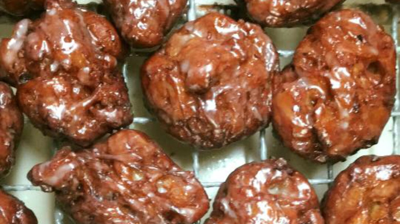 Fresh donuts on a cooling rack