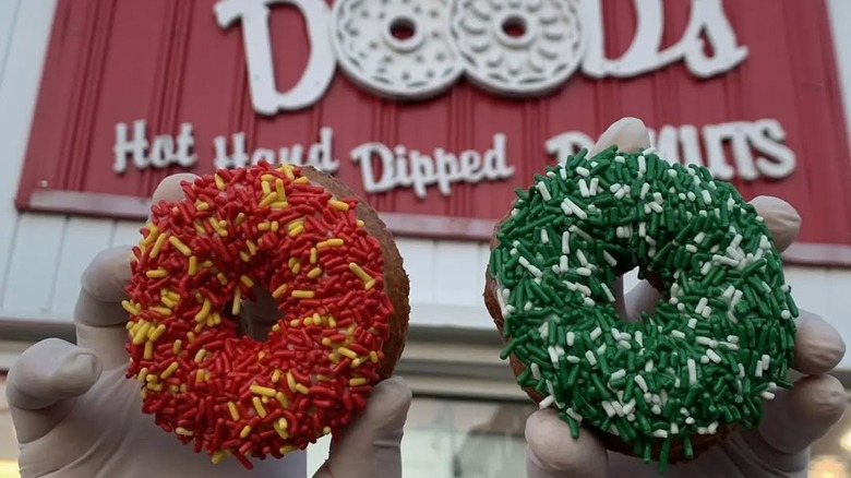 Donuts from Uncle Dood's held by hands