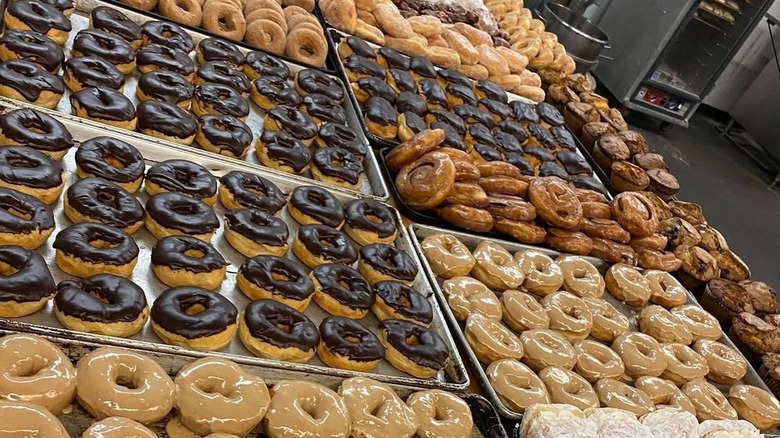 Trays full of donuts
