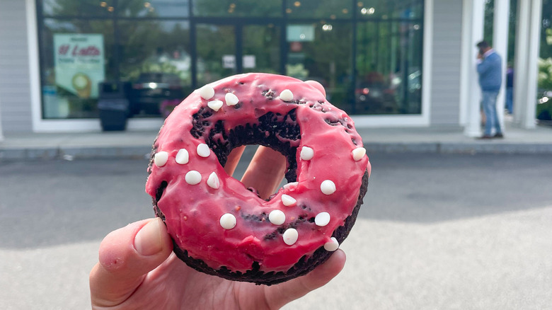 Vegan chocolate doughnut with raspberry glaze