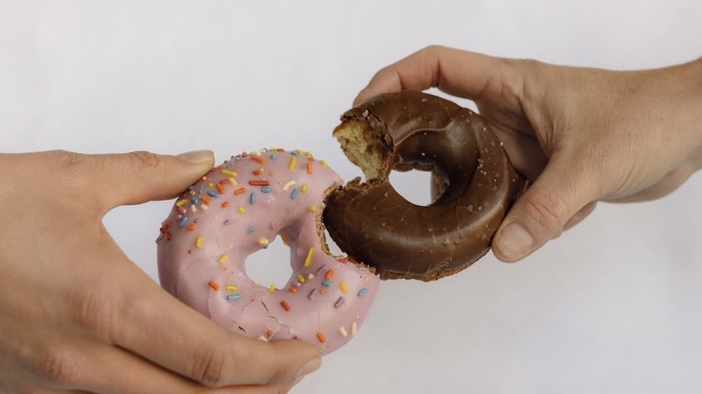 Doughnuts with chocolate frosting and sprinkles