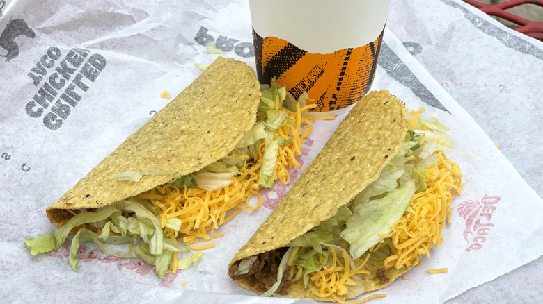 Del Taco tacos and drink on wrapping