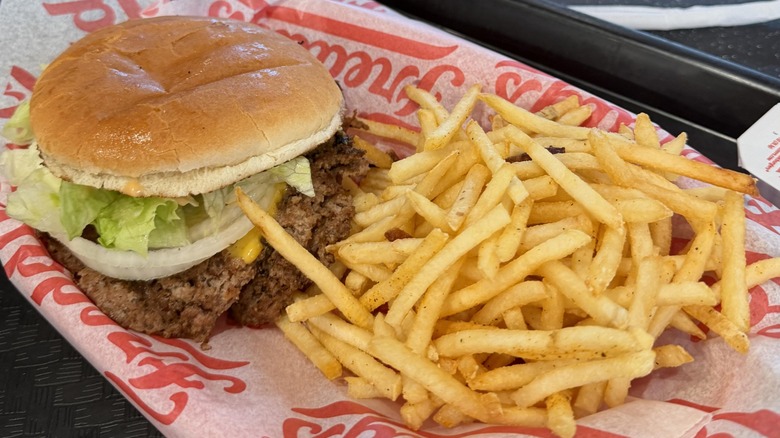 Freddy's burger and fries on tray