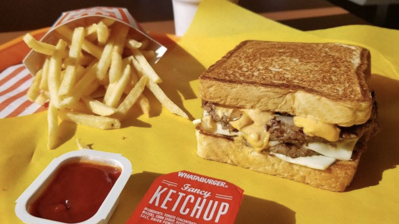 Whataburger Patty Melt meal with fries and ketchup