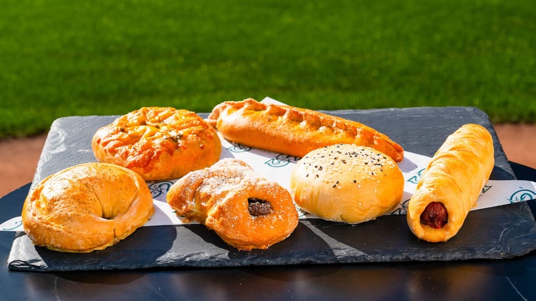 Selection of piroshky on a stone tablet
