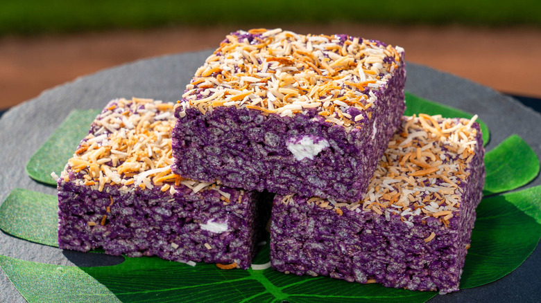 Purple rice krispies treats with coconut on top