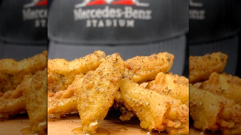 spicy chicken wings on white plate