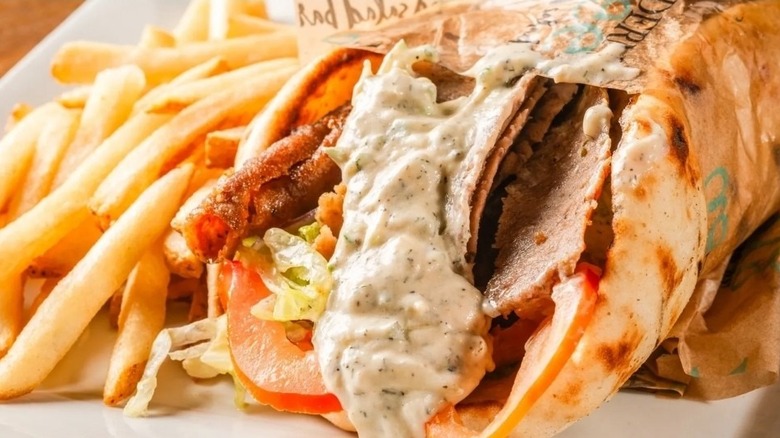 gyro and fries on plate