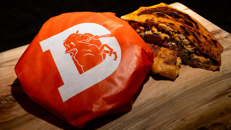 thunder crunch wrap displayed on butcher block