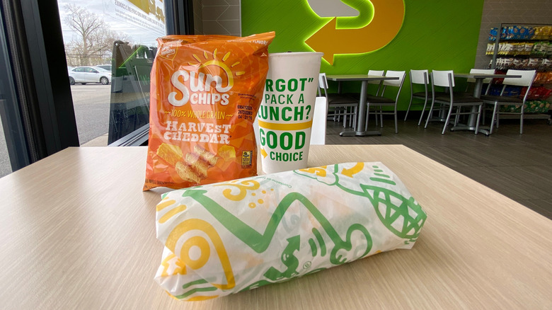 Subway sandwich with chips and drink
