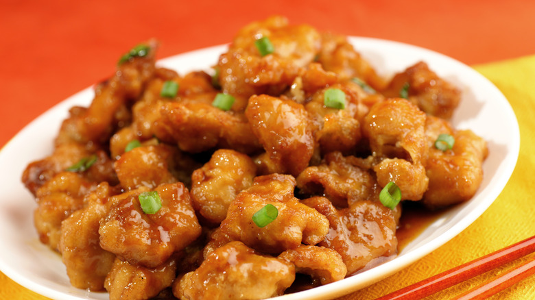 a plate of orange chicken