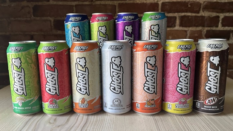 Array of various Ghost Energy Drink flavors on a table.