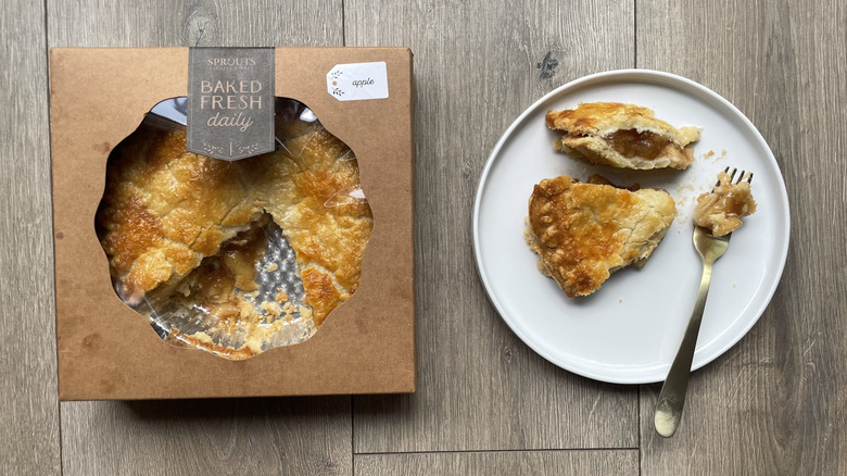 Sprouts apple pie in box and on plate