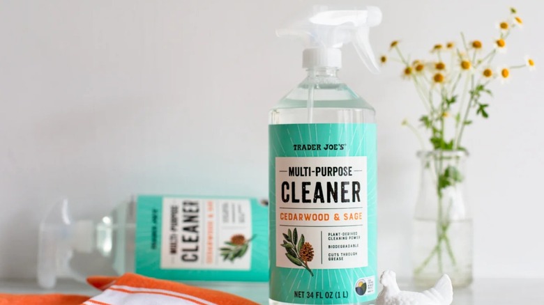 Two bottles of Trader Joe's Multi-Purpose Cedarwood & Sage Cleaner displayed on a counter