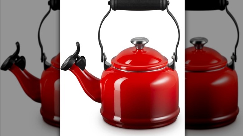 Tea kettle on white background