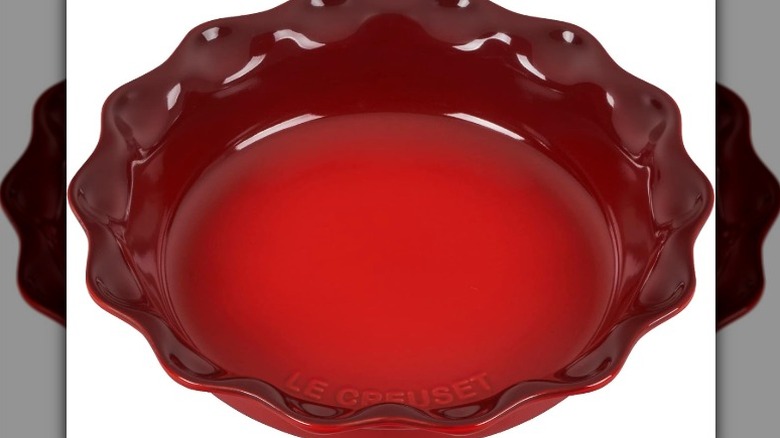 Le Creuset pie dish on white background