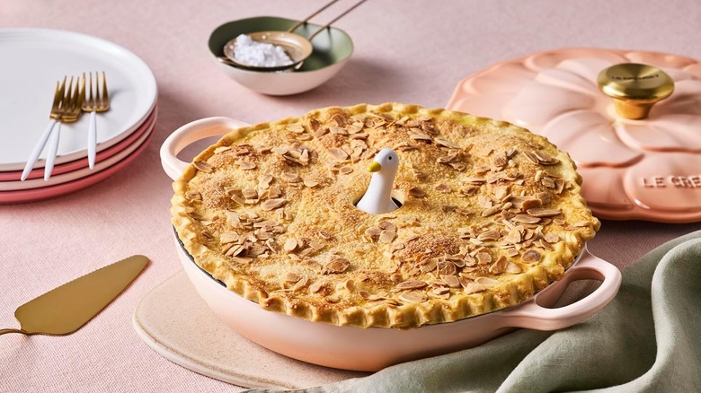 Pie duck poking out of a pie