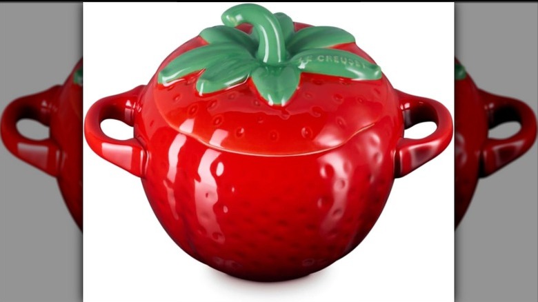 Le Creuset strawberry cocotte on white background