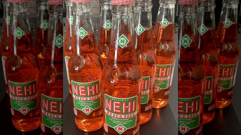 Six bottles of peach-flavored Nehi Soda
