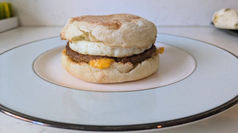 A McDonald's sausage McMuffin on a plate