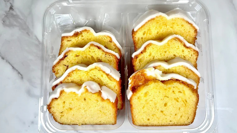the Walmart brand Marketside iced lemon cake slices in their plastic shell container with the lid off