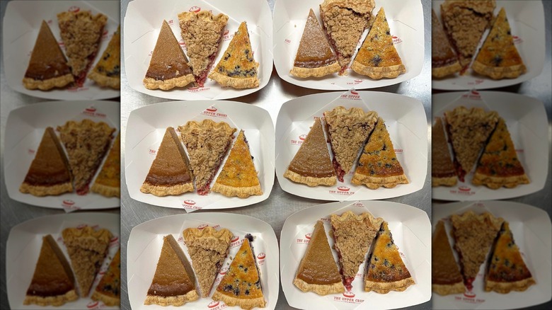 Six white containers each with three slices of pie