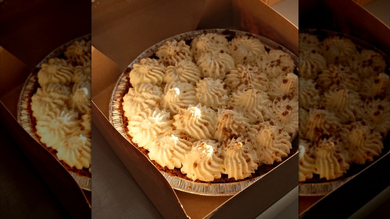 Pie in box with whipped topping