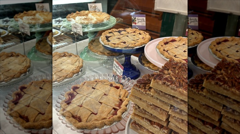 Fruit pies with lattice top on store display counter