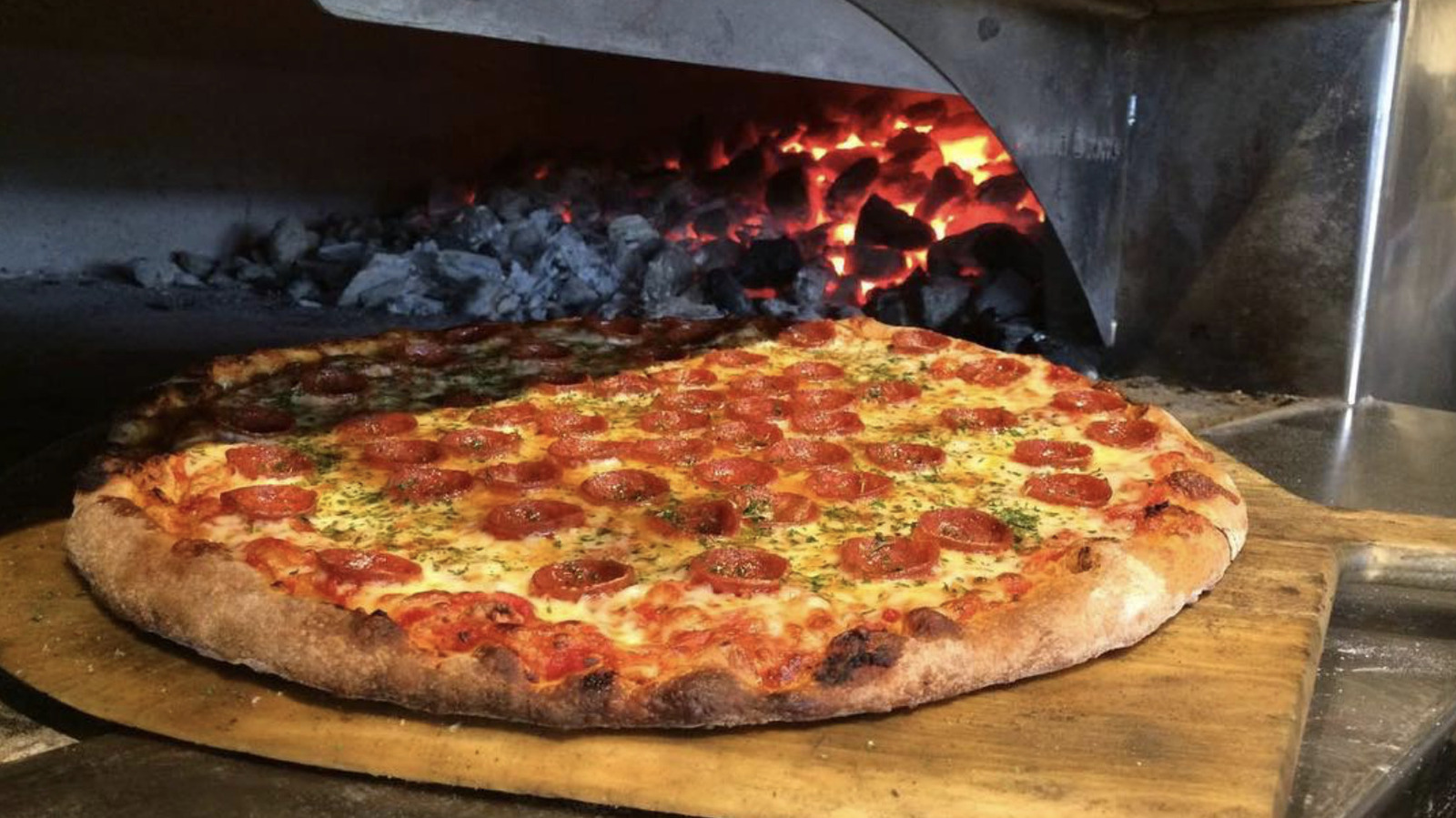 The Best Pizza Place In West Virginia Bakes Pies In The State's Only Coal-Fired Oven - Tasting Table