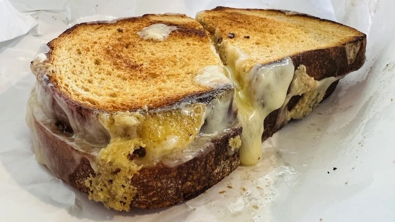 Beecher's grilled cheese sandwich at Pike Place Market on white parchment