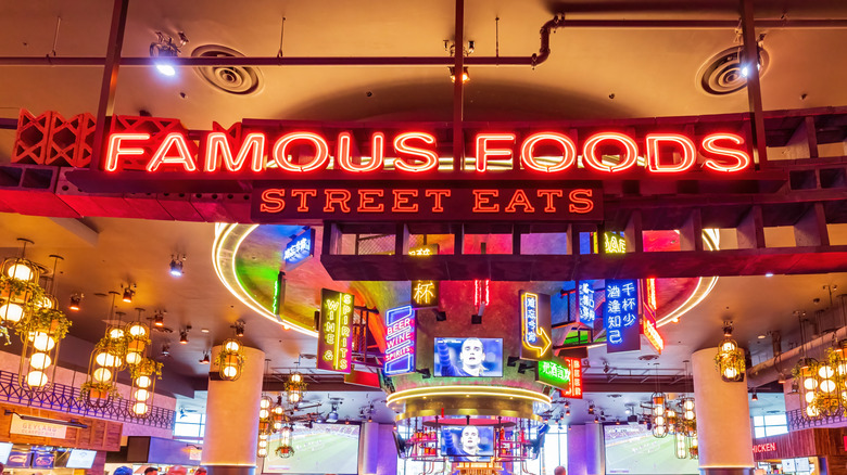 Colorful entrance and neon lights of Famous Foods Street Eats in Las Vegas