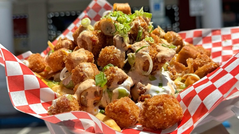 Lumpias on red checkered paper from Sayulitas