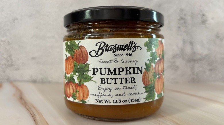 Jar of Braswell's pumpkin butter on grey background