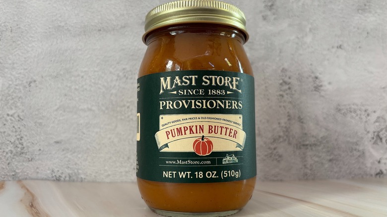 Jar of Mast Store Provisioners pumpkin butter on grey background