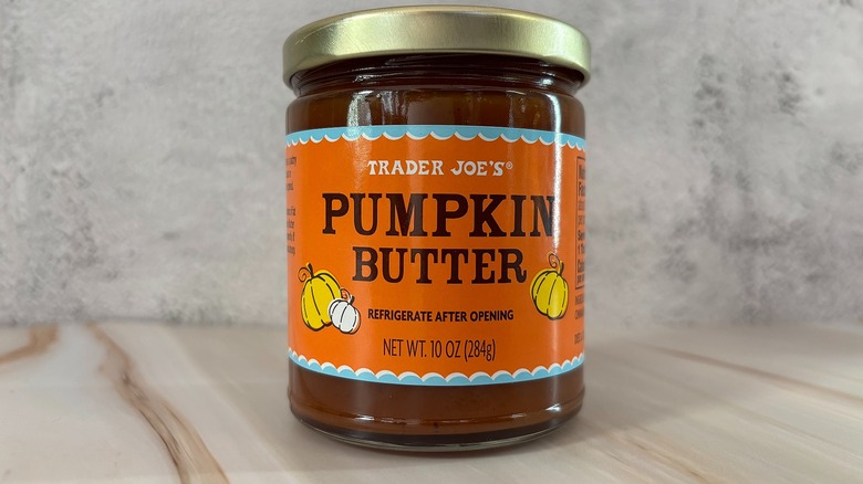 Jar of Trader Joe's pumpkin butter on grey background